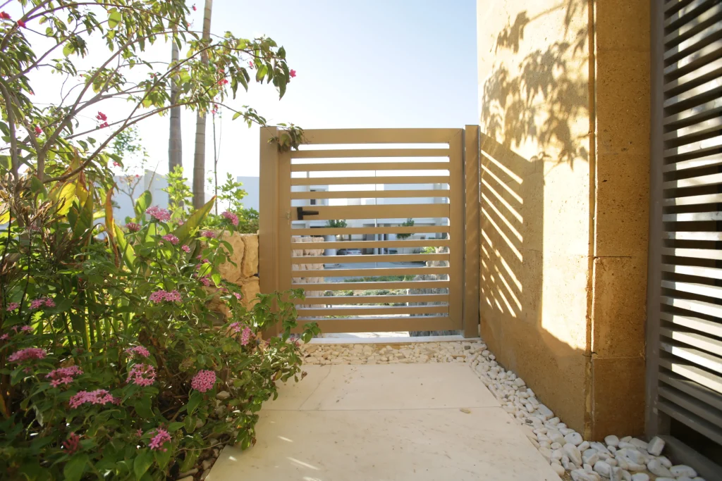 IC5B3959 Elegant garden pathways with soft lighting in a beautifully landscaped residential space in Egypt
