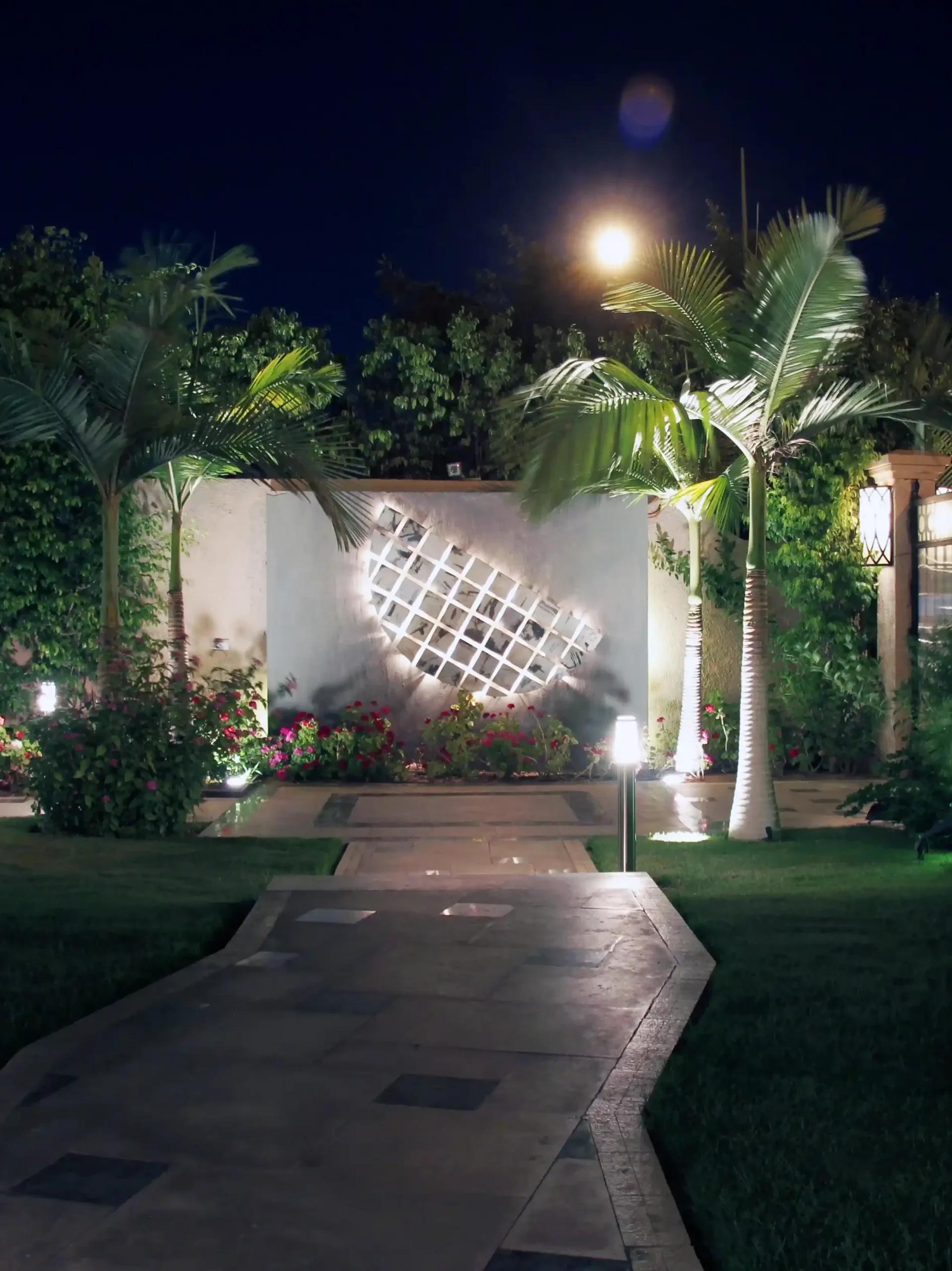 Elegant garden pathways with soft lighting in a beautifully landscaped residential space in Egypt